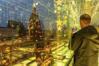 Christmas market in Dortmund, Hansaplatz, view from a pedestrian gallery between 2 department