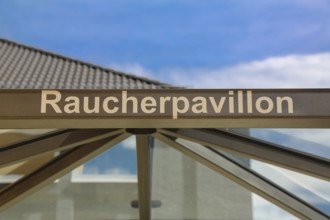 Smoking pavilion, glass shelter, smoking cabin, lettering, letters, Reutlingen, Baden-Württemberg,