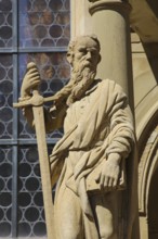 Laurentiuskirche, Protestant church, portal with apostle Paul with sword, stone figure, statue,