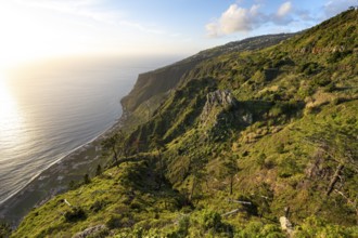 Evening mood, green coastal landscape on a steep cliff, sea and coast, viewpoint Miradouro da