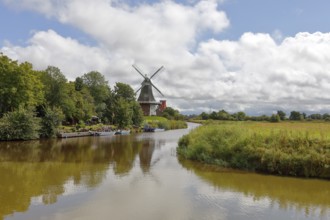 The Green Mill, one of Greetsiel's twin mills on the Old Greetsiel Sieltief, Greetsiel, Krummhörn,