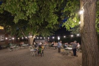 Beer garden illuminated at night, Erlangen, Middle Franconia, Bavaria, Germany, Europe