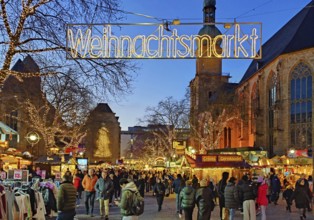 Entrance to the Christmas market with the Reinoldi church in the evening, Dortmund, Ruhr area,