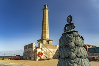 Bronze sculpture Mrs Booth The Shell Lady and the Margate Lighthouse, Kent, England, Great Britain