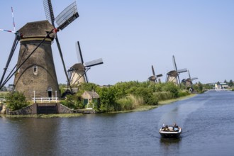 Kinderdijk, 18 windmills designed to pump water from the polders to utilise the land, one of the