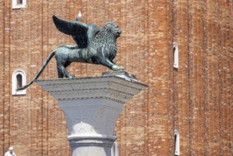 View of the city from the Canale della Giudecca, granite column on St Mark's Square with the Lion