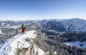 Ski tourers on a mountain ridge, on the ascent to the Teufelsstättkopf, Snow-covered mountain