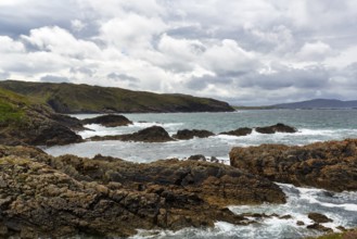 Rugged rocky coast, rain clouds, Melmore, Downings, Boyeeghter Strand, Murder Hole Beach,