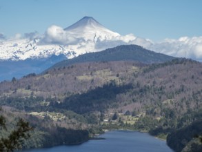 View to volcano Villarica, seen from Park Huerquehue during hike on Los Lagos trail, La Araucania,