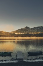 Frosty morning atmosphere during sunrise at Lake Hopfensee in the Allgäu in Bavaria, Germany,