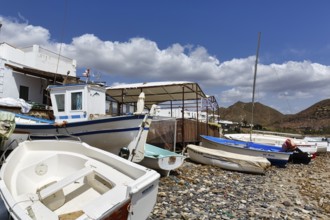 Fishing boats on the pebble beach, Cabo de Gata Natural Park, Las Negras, Almeria, Andalusia,