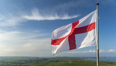 The flag of England, Great Britain, flutters in the wind