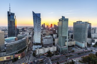 Warsaw skyline high-rise properties in the city centre at sunset in Warsaw, Poland, Europe