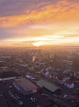 Cityscape under a spectacular sunset with pink and orange sky, Meßkirch, district of Sigmaringen,