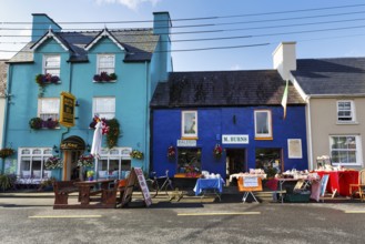 Flea market in front of colourful facades, Sneem, Ring of Kerry scenic road, Iveragh Peninsula,