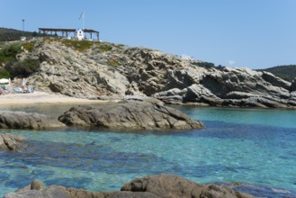 Rocky coastal landscape with crystal clear water and cliffs, peaceful natural scenery, Sarti,