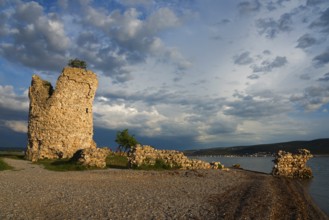 Old ruin by the sea at sunset under a cloudy blue sky, Vecka kula, Vecka Kula, Starigrad,