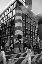 Steaming chimney at a construction site behind a high-rise building, New York City, USA, North