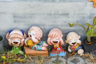 Clay Dolls, Laughing clay figures in the garden, asian, figure, children, childhood, laughing, fun,