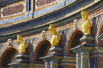 Gilded bust, facade, exterior walls, decorated, colourful, coloured stones, crystals and glass