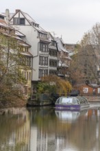 Boat trip in Little France in Strasbourg at Christmas time. Bas-Rhin, Alsace, Grand Est, France,