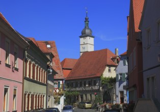 Houses in the centre of the village and the steeple of St John the Baptist Church, Mainbernheim,