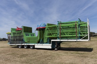 Truck semi-trailer, loaded with construction parts of a ride, Rheinkirmes superstructure,