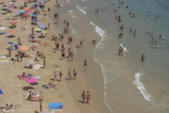 Tourists at Playa de Levante, Benidorm, Alicante, Costa Blanca, Spain, Europe