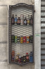 Barred drinks bar on a house wall in the historic city centre, Genoa, Italy, Europe