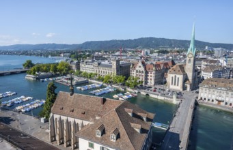 View over the old town of Zurich with river Limmat, church Fraumünster and Münsterbrücke, from the