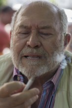 Older gentleman with beard and cigarette, Bavaria, Germany, Europe