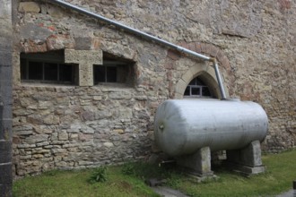 Rainwater collection tank at the fortified church Michaeliskirche, monastery church of a