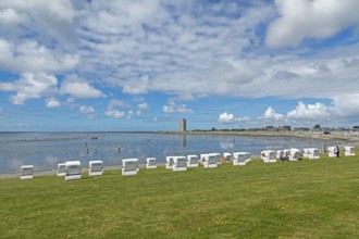 Beach chairs, green beach, high-rise building, Büsum, Schleswig-Holstein, Germany, Europe