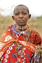 Maasai woman wearing traditional costume, Amboseli National Park, Rift Valley Province, Kenya,