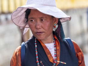 Tibetan woman, pilgrim in Xigaze, Tibet, China, Asia