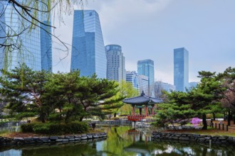 SEOUL, SOUTH KOREA, APRIL 6, 2018: Yeouido Park public park surrounded with skyscrapers in Seoul,