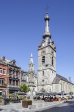 Saint Peter and St Paul Collegiate Church and Princes' fountain at Grand Place in the city Chimay,