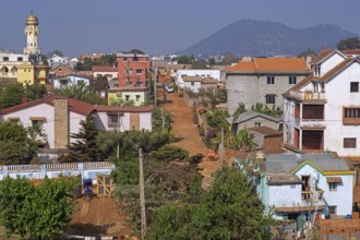 View over the city Antsirabe showing houses, unpaved road and Muslim mosque, Vakinankaratra Region,