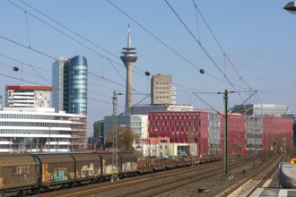 S-Bahn station, Düsseldorf-Hamm stop, Düsseldorf city centre skyline, Media Harbour, railway line