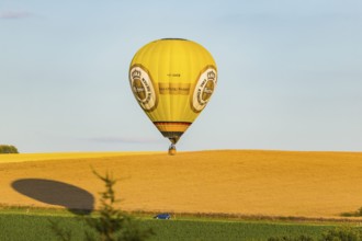 Summer balloon flight over the foothills of the Osterzgebirge mountains