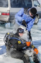 Hotwater on regulators to avoid freezing during the dive under ice, Lake Baikal, Olkhon Island,