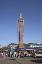 Luisenplatz with Ludwig monument with tram stop, obelisk, column, monument, group of people,