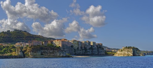 Morning city view of the medieval old town of Tropea with the church Santuario di Santa Maria,