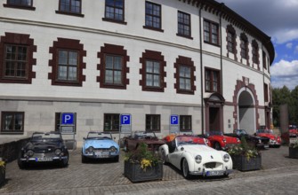 Vintage car parade in front of the castle, round building of Elisabethenburg Castle, Meiningen,