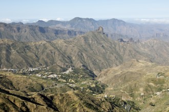 View from Cruz de Tejeda, Parque Rural del Nublo, in the back Roque Batayga, below the village of