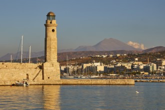 Venetian harbour, Venetian lighthouse, boat, water reflection, Ida massif, Psiloritis, spring