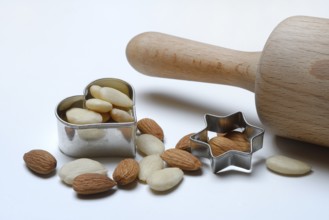 Almonds and biscuit cutters for biscuits