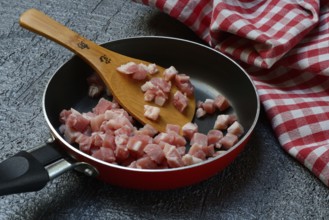 Bacon, bacon cubes in pan