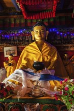 SPITUK, INDIA, SEPTEBMER 16, 2012: Buddha Sakyamuni statue in Spituk Gompa (Tibetan Buddhist