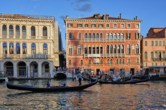 VENICE, ITALY, JUNE 27, 2018: Grand Canal with boats and gondolas on sunset, Venice, Italy, Europe